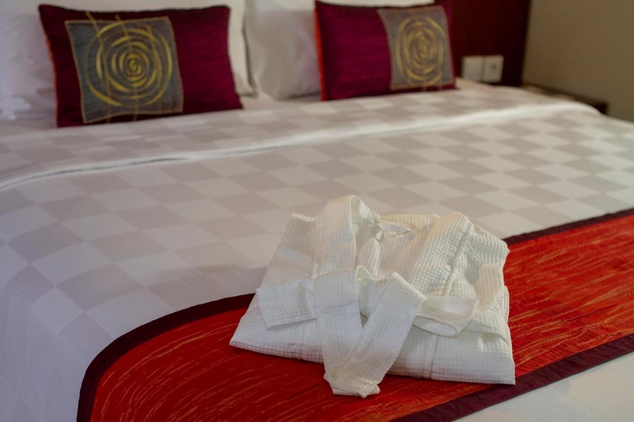 Primebiz Hotel Kuta Кута Экстерьер фото